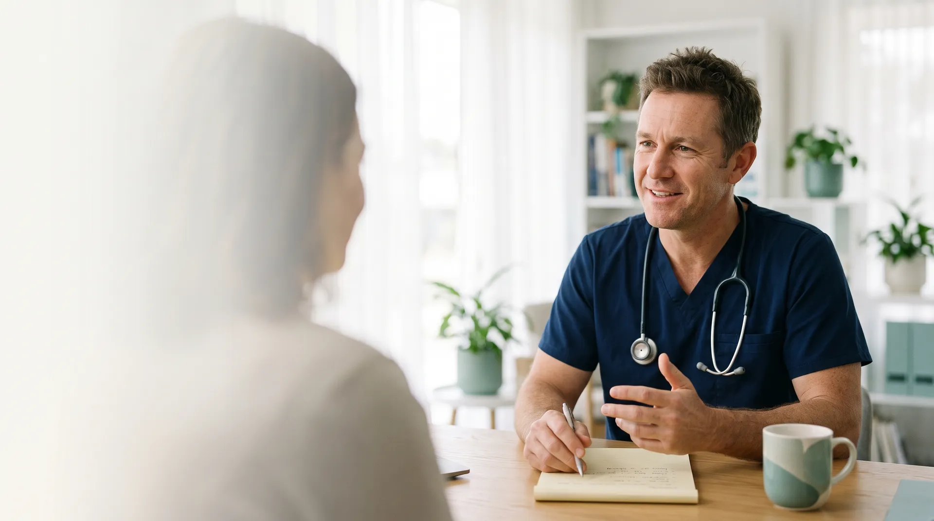 A doctor during a phone consultation